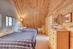 Knotty Pine Chalet bedroom with queen bed. 
